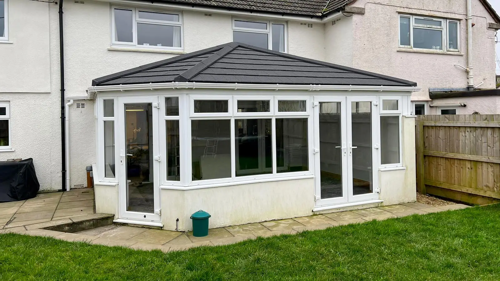 White upvc conservatory with tiled roof