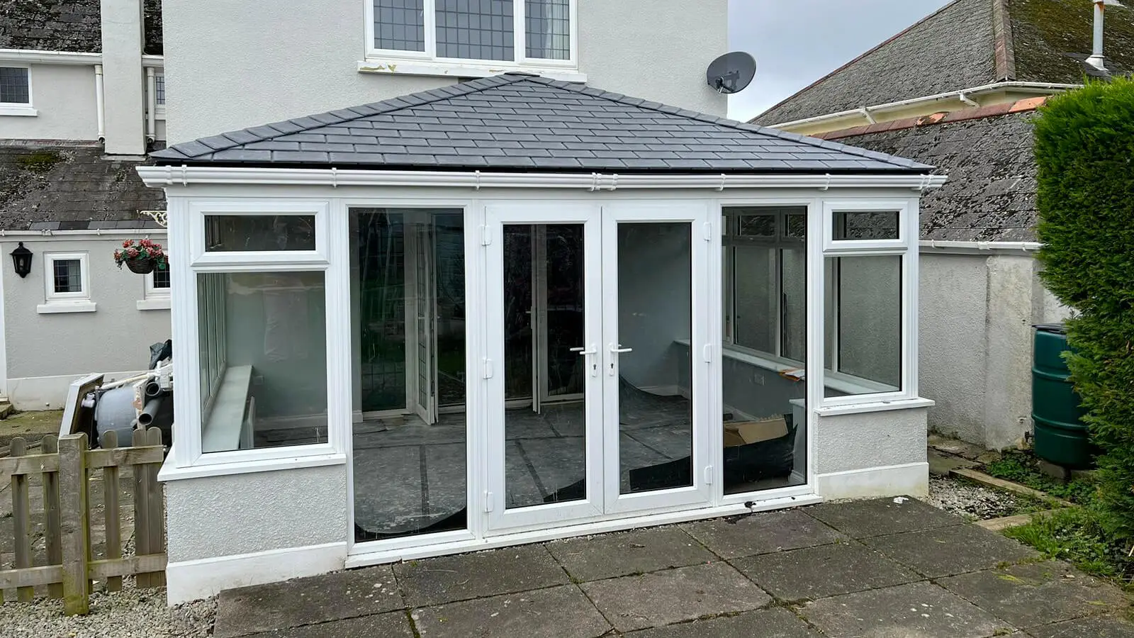 white upvc tiled roof conservatory